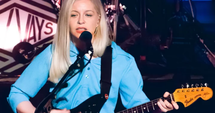 Molly Rankin of Alvvays singing and playing a Fender Jaguar